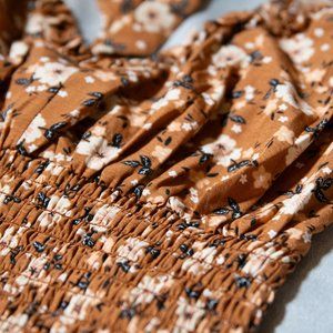 Floral Boutique top- ties in the back